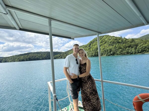 Couple On Boat With Scenic Plitvice Lake View