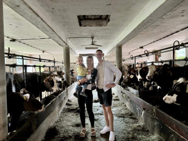 Family Visiting Dairy Farm