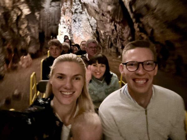 Group In Cave Tour Train RIde