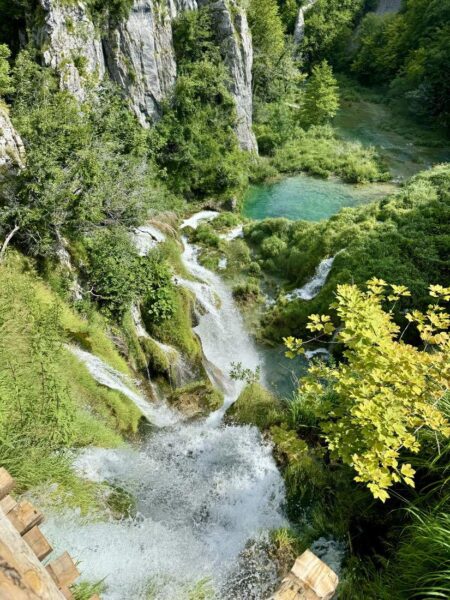 Plitvice Lakes Scenic Waterfall And Lush Greenery